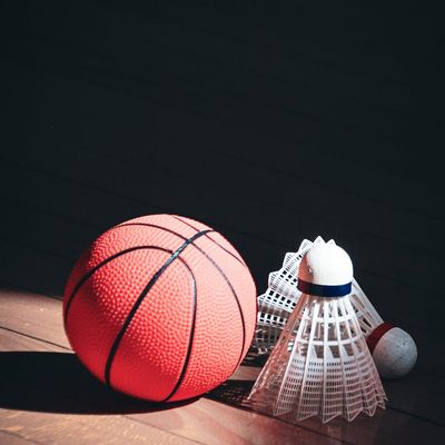 Close up of sports equipment on a wooden floor